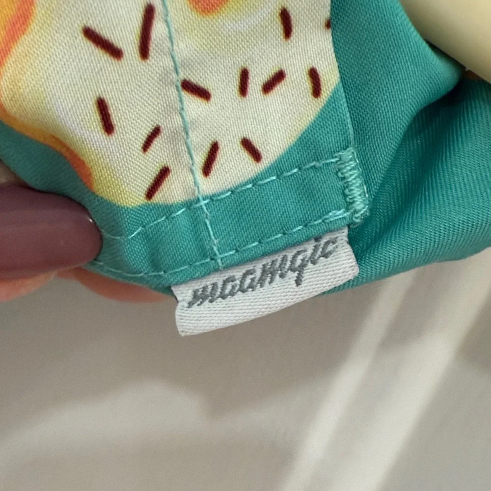 Vibrant Teal Kids Swim Trunks with Donut Design